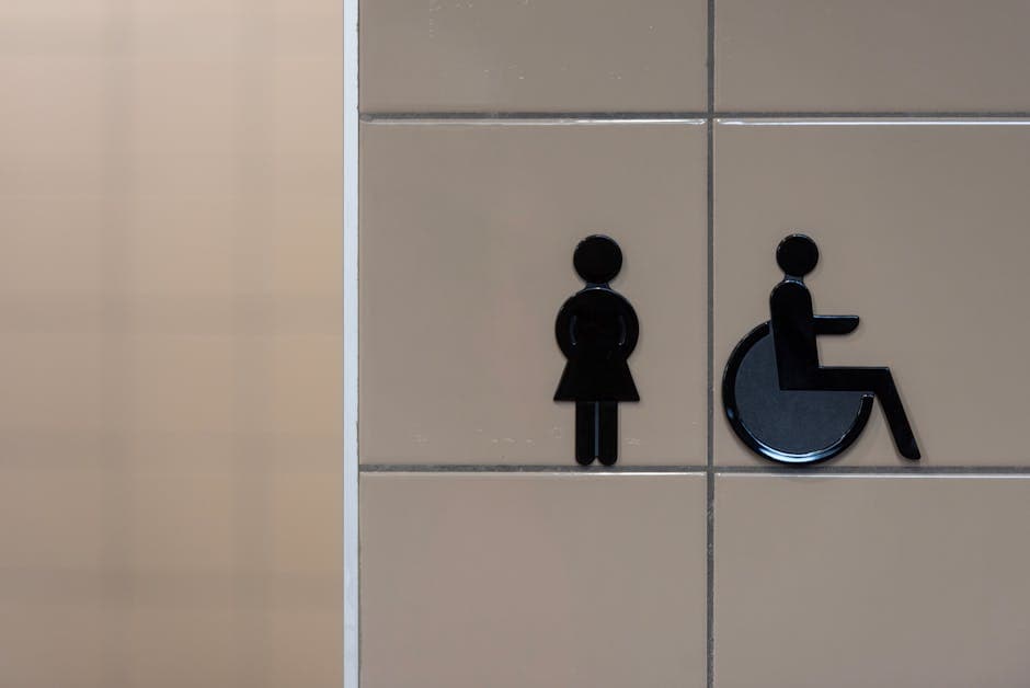 Accessible seating and restroom signage inside a restaurant.