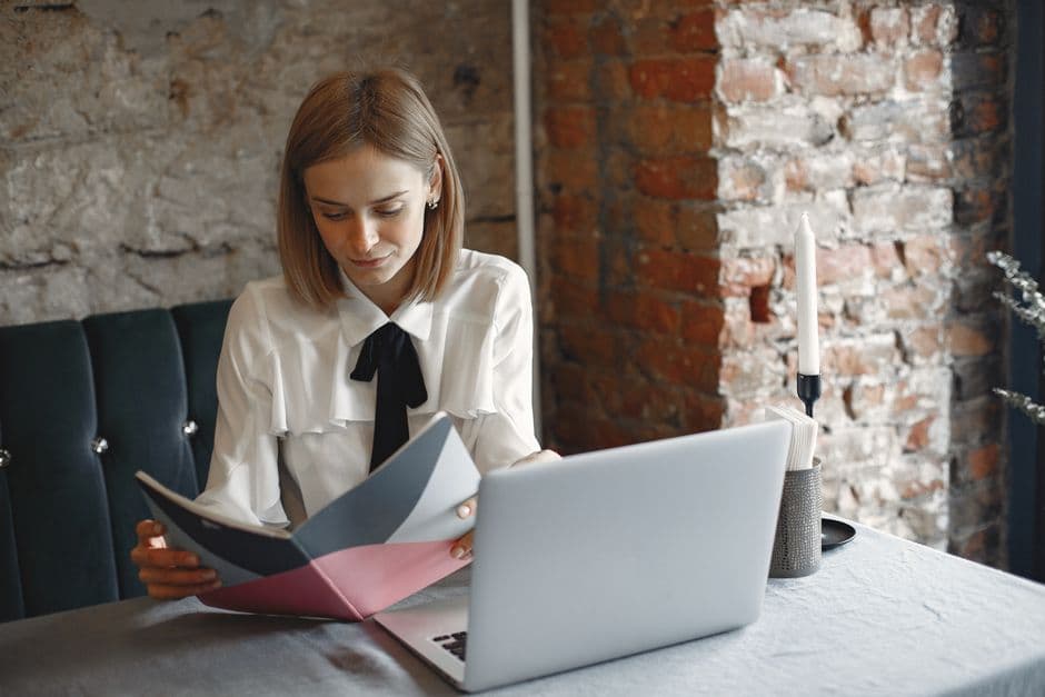 Restaurant owner reviewing digital menu performance and featured item results