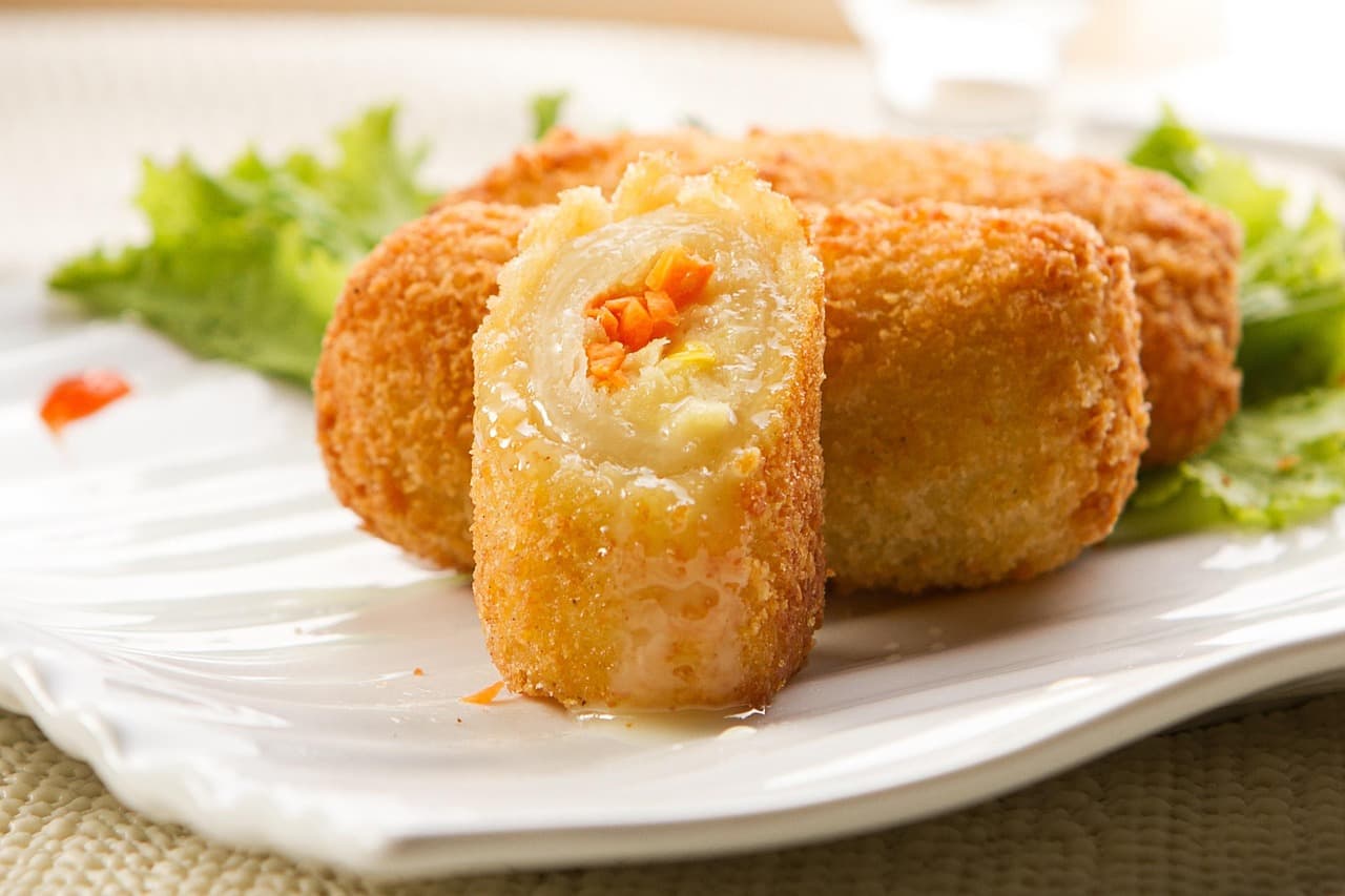 Online restaurant menu showing natural upsell suggestions for sides and drinks.