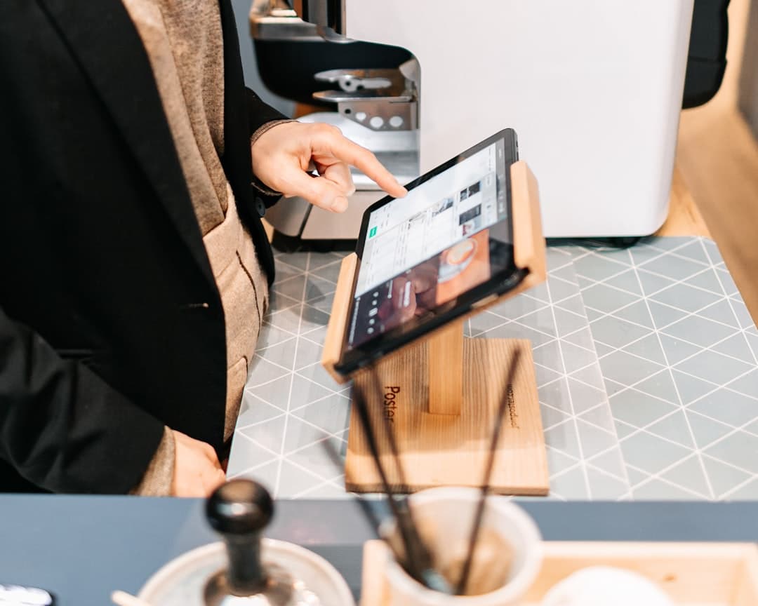 Guest reviewing a restaurant mobile checkout with tip, tax, and total clearly displayed