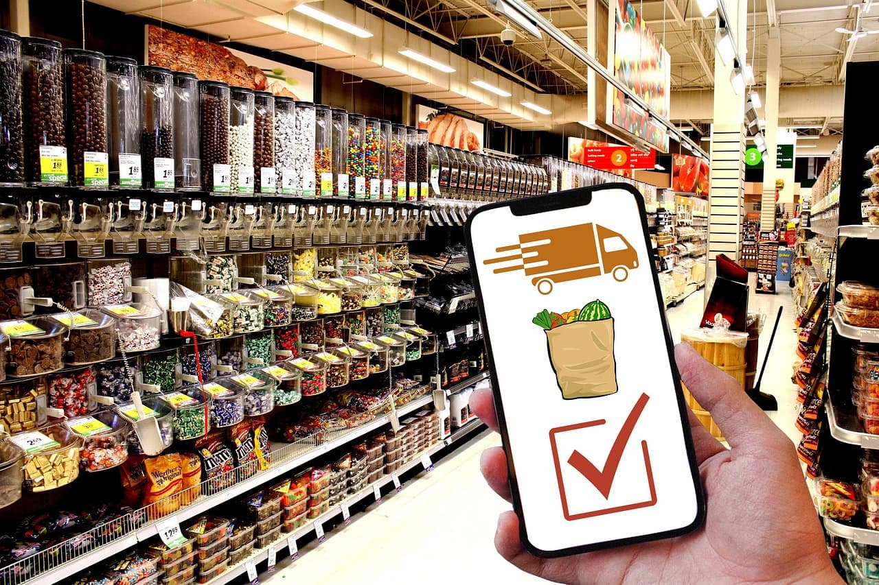 Restaurant staff managing online orders with kitchen notifications for pickup and delivery