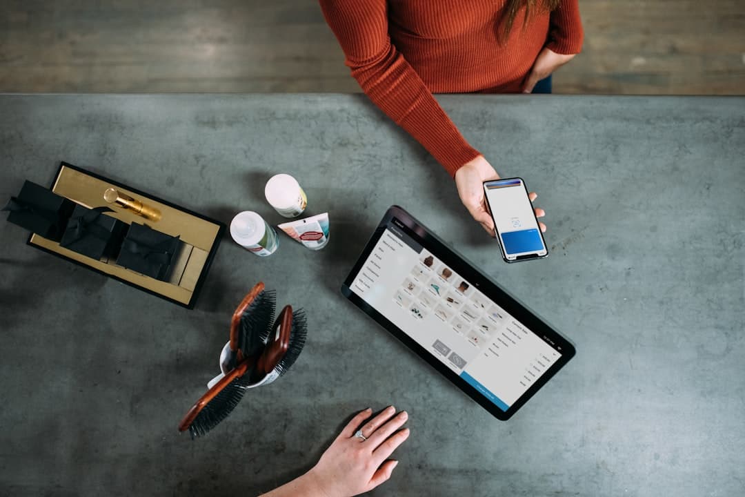 Restaurant manager reviewing online ordering payment setup on a tablet before launch.