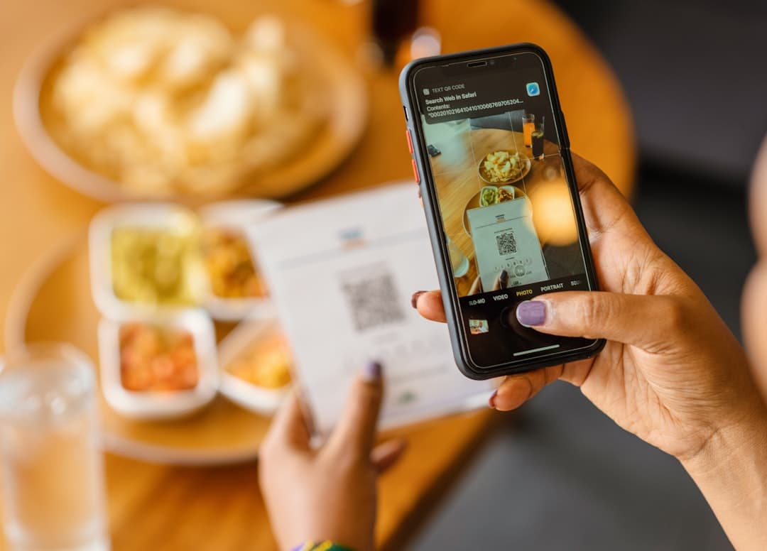 Guest scanning a QR code and testing a restaurant digital menu on a smartphone.